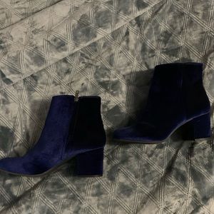 Women’s blue suede booties.